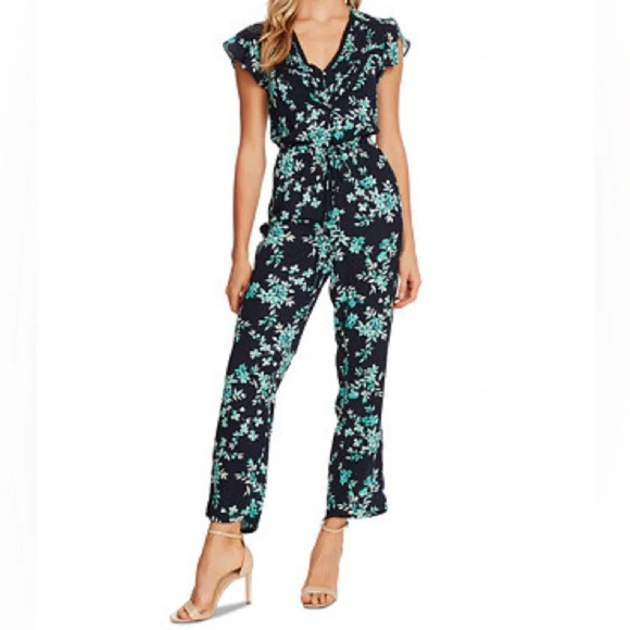 CeCe Pants - CeCe Breeze Boutique Navy Blue Floral Flutter Jumpsuit Romper Women’s Size 10
